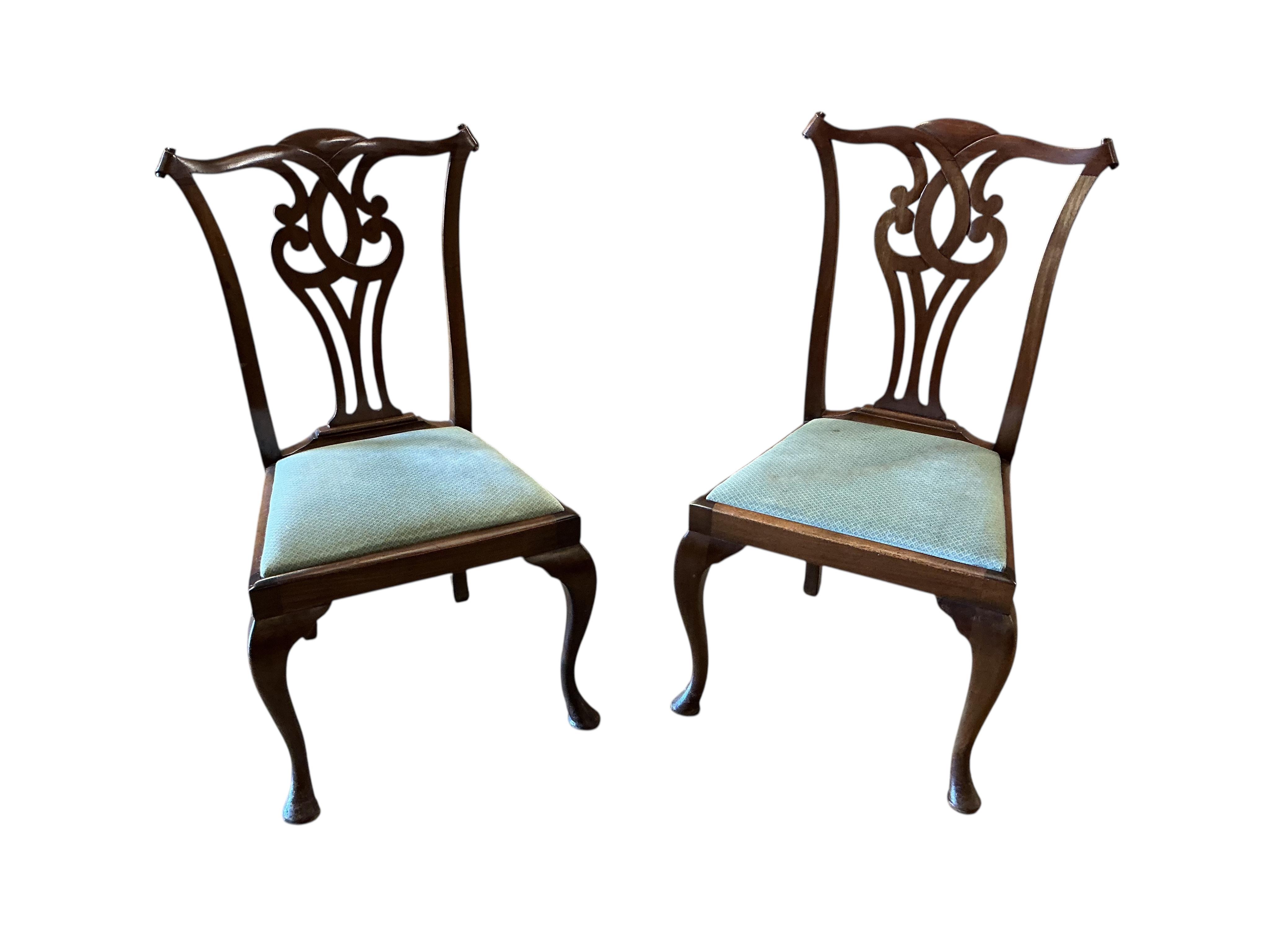 A set of eight George III style mahogany dining chairs, two with arms